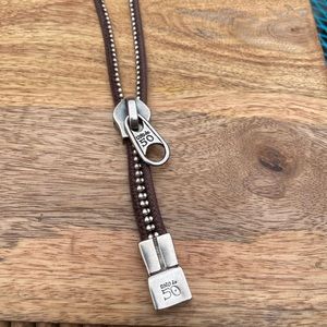 Beautiful sterling silver and leather necklace.